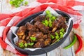 fried sticky ribs seasoned with spicy garlic ginger barbecue sauce Royalty Free Stock Photo