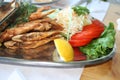 Fried surmullet fish with vegetables