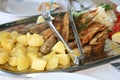 Fried surmullet and goby fish with potato