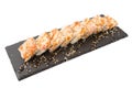 Fried sushi salmon sushimi on a black surface on white Royalty Free Stock Photo