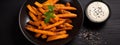 fried sweet potatoes with gravy. Selective focus.