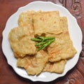 fried tempeh with cayenne pepper on a plate Royalty Free Stock Photo