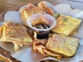 Fried tempeh or mendoan with soy sauce