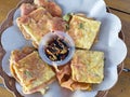 Fried tempeh or mendoan with soy sauce