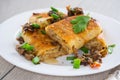 fried thin pancakes stuffed with meat and mushrooms.