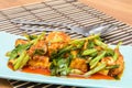 Fried Tofu with chinese kale in red curry saurce Royalty Free Stock Photo
