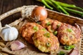 Fried tuna pancakes with potato, onion and garlic