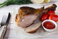 Fried turkey leg with ketchup on parchment Royalty Free Stock Photo
