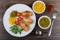 Fried turkey meat with greens and vegetables in dish, pepper Royalty Free Stock Photo