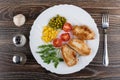 Fried turkey meat with greens and vegetables in white dish Royalty Free Stock Photo