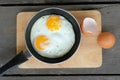 Fried twin eggs with pan Royalty Free Stock Photo