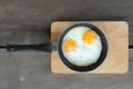 Fried twin eggs with pan Royalty Free Stock Photo