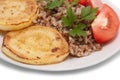 Fried vegetable marrows and buckwheat cereal