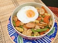 Fried vegetables mixed sausage served with fried egg Royalty Free Stock Photo