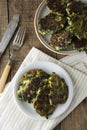 Fried vegetarian broccoli and spinach fritties, for burgers on a wooden table. Vegetarian and healthy food