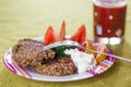 Fried vegetarian cutlet and vegetables