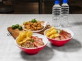 Fried Wanton and Sarawak Mee Tai Bak dry and soup with two minrel water Royalty Free Stock Photo