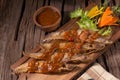 Fried Whisker sheat fish with chili sauce Royalty Free Stock Photo