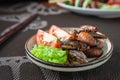 Fried Worm, Insect food with vegetable salad in the white bowl. Healthy meal high protein diet concept. Royalty Free Stock Photo