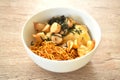 fried yakisoba Japanese noodles and cabbage topping egg and sausage dressing seaweed in sauce on bowl Royalty Free Stock Photo