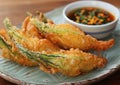 Fried zucchini flowers on a plate Royalty Free Stock Photo