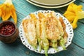 Stuffed zucchini flower on plate Royalty Free Stock Photo