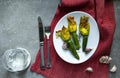 Fried Zucchini Flowers Stuffed with cream cheese with garlic. Copy space Royalty Free Stock Photo