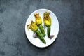 Fried Zucchini Flowers Stuffed with cream cheese with garlic on white plate. Copy space Royalty Free Stock Photo