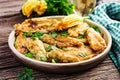 Fried zucchini flowers stuffed with ricotta and green herbs. Royalty Free Stock Photo