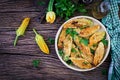 Fried zucchini flowers stuffed with ricotta and green herbs. Royalty Free Stock Photo