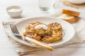 Fried zucchini slices in egg batter with garlic on a plate. Royalty Free Stock Photo