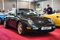 FRIEDRICHSHAFEN - MAY 2019: black PORSCHE 911 993 CARRERA 1994 cabrio at Motorworld Classics Bodensee on May 11, 2019 in Royalty Free Stock Photo