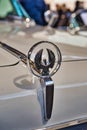 FRIEDRICHSHAFEN - MAY 2019: logo emblem of white CHRYSLER IMPERIAL CROWN 1963 cabrio at Motorworld Classics Bodensee on May 11, Royalty Free Stock Photo