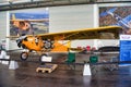 FRIEDRICHSHAFEN - MAY 2019: orange plane CURTISS ROBIN J-1 1929 at Motorworld Classics Bodensee on May 11, 2019 in Friedrichshafen Royalty Free Stock Photo