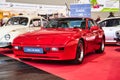 FRIEDRICHSHAFEN - MAY 2019: red PORSCHE 944 1986 coupe at Motorworld Classics Bodensee on May 11, 2019 in Friedrichshafen, Germany Royalty Free Stock Photo