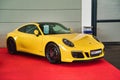 FRIEDRICHSHAFEN - MAY 2019: yellow PORSCHE 911 991 CARRERA GTS coupe 2014 at Motorworld Classics Bodensee on May 11, 2019 in Royalty Free Stock Photo