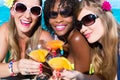 Friend drinking cocktails in swimming pool bar Royalty Free Stock Photo