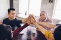 Friend giving high five at cafe Royalty Free Stock Photo