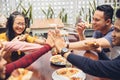 Friend giving high five at cafe Royalty Free Stock Photo