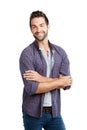 Friendliness will take you everywhere. Studio shot of a young man posing against a white background. Royalty Free Stock Photo