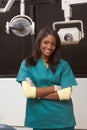 Friendly African-American dentist woman in office