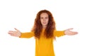 Friendly amazed cute redhead caucasian girl in yellow t-shirt extend arms sideways, move towards camera to give hug, inviting