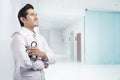Friendly of asian doctor man with white lab coat and stethoscope Royalty Free Stock Photo
