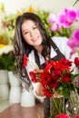 Chinese Saleswoman in a flower shop