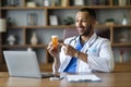 Friendly black doctor working online, having video chat with patient Royalty Free Stock Photo