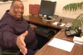 friendly black man in office