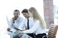 Friendly business team discussing promising business ideas. Royalty Free Stock Photo