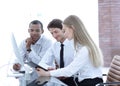 Friendly business team discussing promising business ideas. Royalty Free Stock Photo