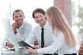 Friendly business team discussing promising business ideas. Royalty Free Stock Photo
