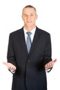 Friendly businessman with welcome gesture Royalty Free Stock Photo